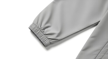 elastic cuff and sleeve area of a light grey windbreaker