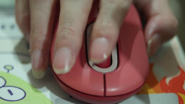 close up of red mouse scroll hand