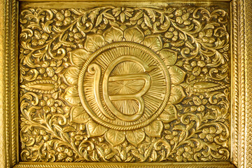sikh gurudwara gold relief door