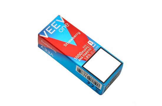 Photo of a VEEV One strawberry disposable vape package. VEEV One is a rechargeable pod vape with replaceable pods, designed and manufactured by Philip Morris.