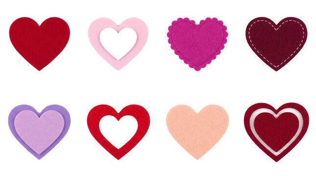 Felt heart set including red, pink, purple, stitched, and layered designs isolated. Valentine's Day craft and decoration collection.