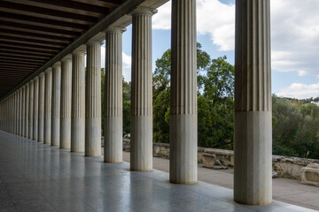 Ancient Greek Architecture of Stoa of Attalos in Athens Greece featuring Marble Doric Columns and Colonnade in the Ancient Agora Archaeological Site