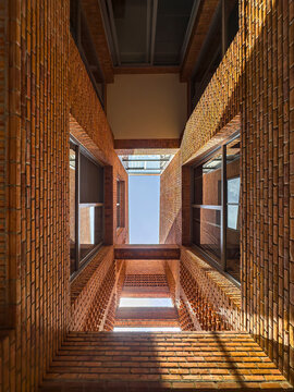 Dramatic Worm's Eye View of Architectural Detail of Textured Brickwork in Modern Urban Design 