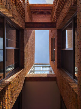 Dramatic Worm's Eye View of Architectural Detail of Textured Brickwork in Modern Urban Design 