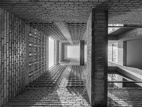 Dramatic Worm's Eye View of Architectural Detail of Textured Brickwork in Modern Urban Design 