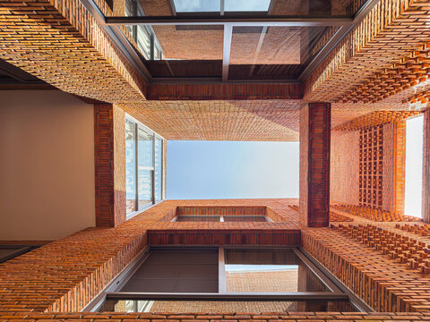 Dramatic Worm's Eye View of Architectural Detail of Textured Brickwork in Modern Urban Design 