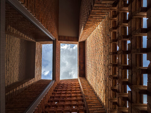 Dramatic Worm's Eye View of Architectural Detail of Textured Brickwork in Modern Urban Design 