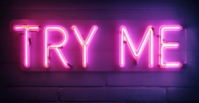 Bright pink neon sign displays TRY ME against dark brick wall. Bold lettering creates vibrant, inviting visual statement.