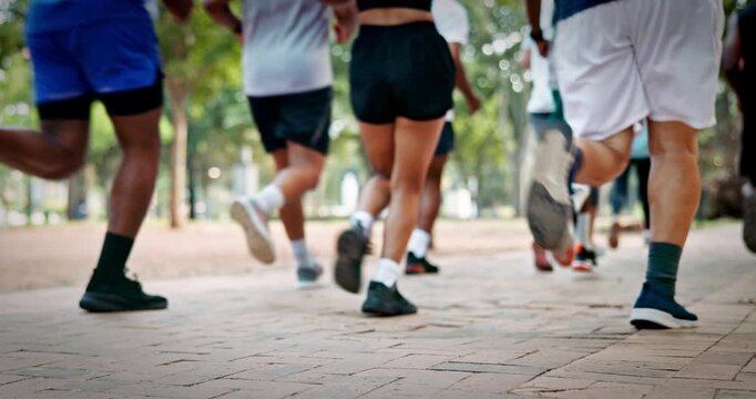 People, feet and running club in park with fitness, marathon preparation and endurance performance. Group, legs and shoes outdoor with sports challenge, cardio workout and exercise for race training.