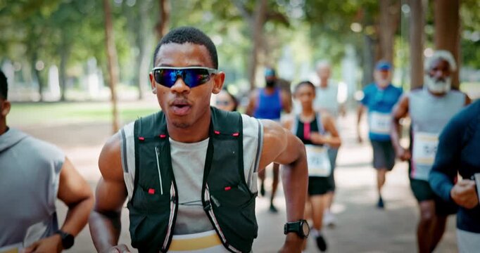 Running, marathon and people outdoor for race, endurance challenge and fitness event. Sports, athlete and men and women in park for runners contest, competition and exercise for cardio workout