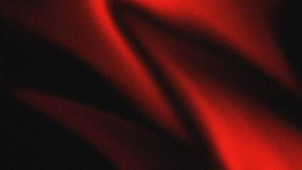 Abstract background with red and black color gradients with soft curves resembling folds of luxury fabric such as velvet or silk and has a rough grained texture.