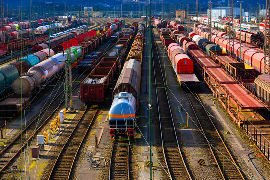 The freight station in Hagen-Vorhalle is one of the largest facilities of its kind in Europe. Here, trains are divided and reassembled on countless parallel tracks. Panorama with colourful wagons.