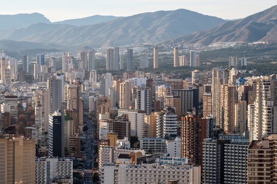 Aerial daylight view of urban skyline city skyscraper architecture with mountains and coast in benidorm spain panorama from high viewpoint
