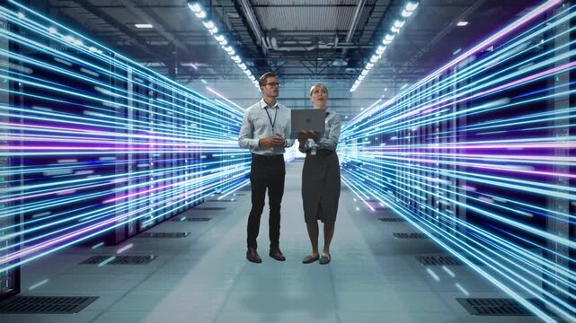 IT Technician and Female Data Engineer Walk in data center, work on Laptop, Information Flow Line Overlays, Performance Activation, Bandwidth Validation, Redundancy Testing, Monitoring