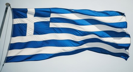 Obraz premium Waving Greek flag; blue stripes, white cross against grey sky backdrop