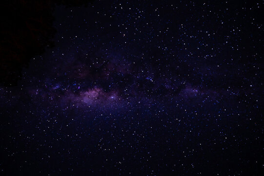 Nebula in a dark starry night sky