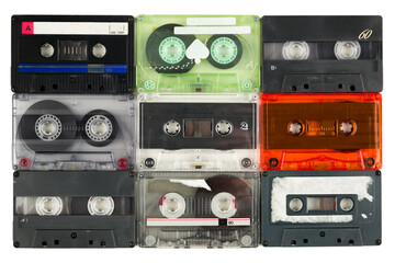 Naklejka premium Set of retro cassette tapes variety, isolated on white background. Top view.