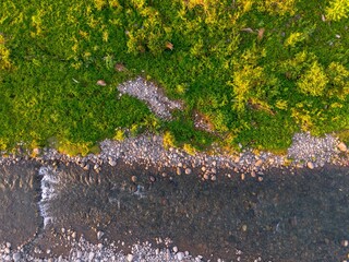 Beautiful morning view in Indonesia, panoramic landscape of rice fields with mountain ranges and clear sky