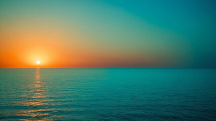 Obraz premium A liquid mirror where the amber heart of the day dissolves into the cooling embrace of a turquoise twilight