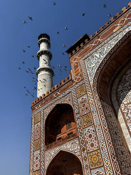 Akbar&rsquo;s Tomb at Sikandra in Agra with Birds in Blue Sky