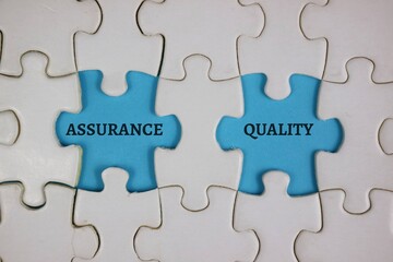 Fototapeta premium Interlocking blue Puzzle Pieces Representing Assurance And Quality In Business