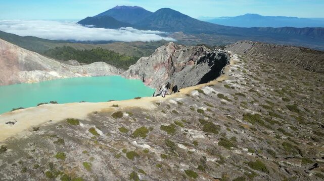 Hiking Trail Around Kawah Ijen Volcano Crater Rim With Tourists Drone Pull Back Long 4K 30FPS