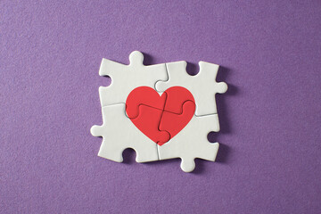 heart shaped with puzzle pieces