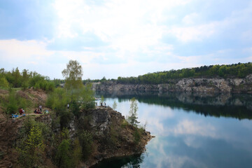 Fototapeta premium Zalew Zakrzówek - an artificial reservoir in Krakow in Zakrzówek. It was created in 1992 after the flooding of an old limestone quarry. It consists of two reservoirs, connected by an isthmus