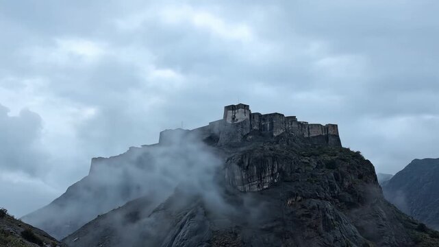 Raigad Fort Hilltop Fortress Covered in Mist and Cloudy Sky