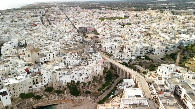 Aerial Drone View of Polignano a Mare Old Town and Cliffside Coast in Puglia, Italy