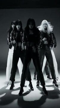  The elegant start with three models in a minimalist monochrome setting as the foundation and then unfolding their smooth, synchronized choreography in a high-fashion editorial style 