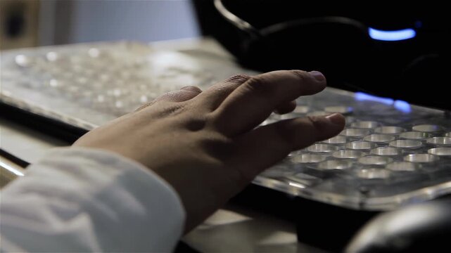 Close Up of a Hand Exploring an Adaptive Keyboard for Visual Impairment, Accessibility Concept - 4K