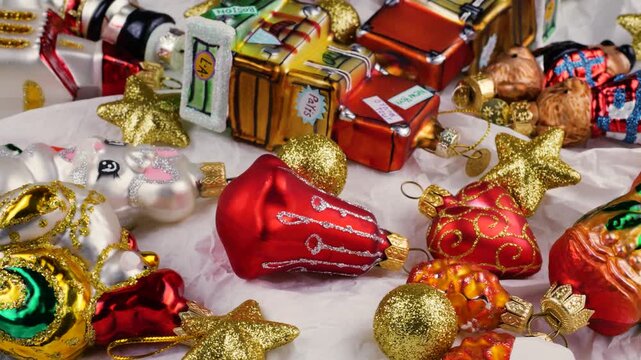 Festive holiday travel decorations on white background. Vintage-style Christmas ornaments featuring city names like Boston, New York, Paris and Los Angeles. 