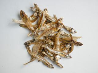 Obraz premium fried anchovies in isolated concept on white background