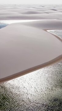 Sunset Lencois Maranhenses At Santo Amaro Maranhao Brazil. Unique Landscape Of White Sand Dunes And Crystal(Clear Lagoons. Sunrise Clouds Sky Beach Sea. Sunrise Outdoor Panoramic.