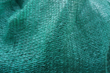 Abstract background texture. Multipurpose green shade net