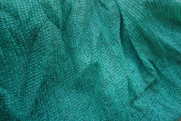 green fabric texture. shade net