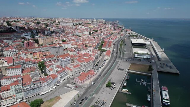 Overhead push over Tagus riverfront in Lisbon, Portugal