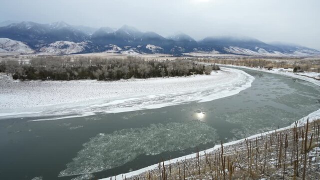 Pan downstream of Icy river below Montana Mountains