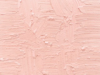 Fototapeta premium Pink textured paint surface with layered brush strokes. Artistic abstract background perfect for creative, feminine, and contemporary visual projects.