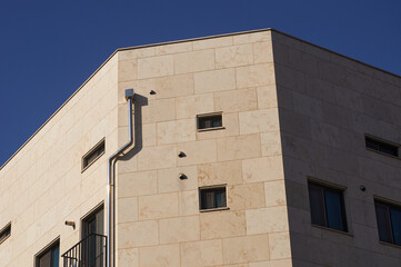 Minimal building corner and blue sky background