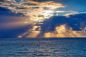 Colorful sunset sky on the horizon above sea surface