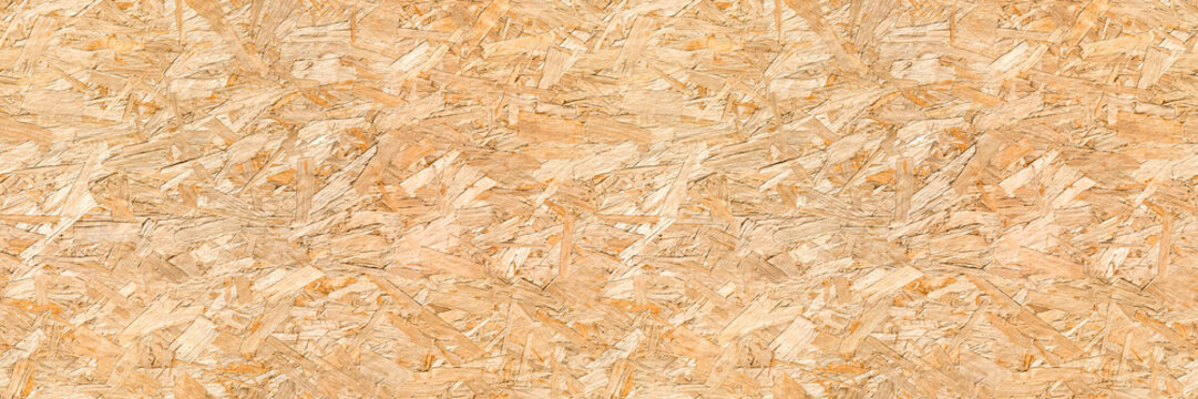 OSB Oriented strand board wood house seamless background texture &ndash; pattern of flat fibreboard building panel from wooden chip material used in construction of floor, roof and walls.