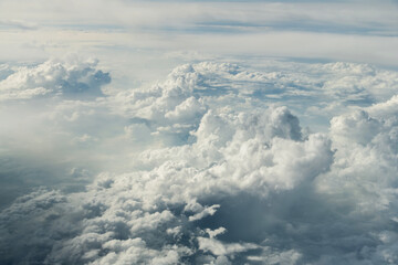 View of blue sky and white clouds during the flight.