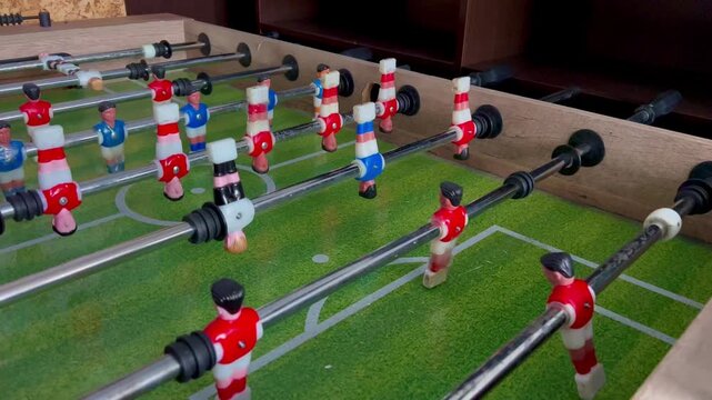 table football players in an office game room