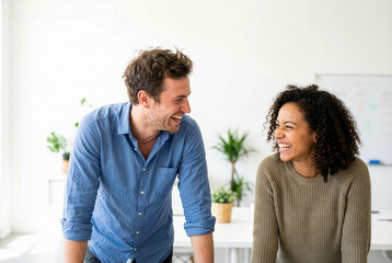 Casual Startup Coworkers Sharing a Lively Conversation