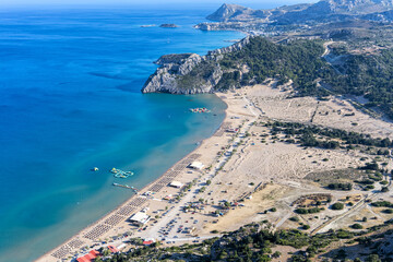 Obraz premium View of Tsambika Beach from above vacation at the Aegean Sea Rhodes island, Greece