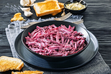 Beet salad with mayo and garlic in bowl