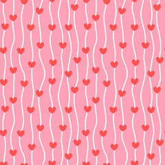 Seamless romantic heart pattern with red hearts on flowing white lines over soft pink background
