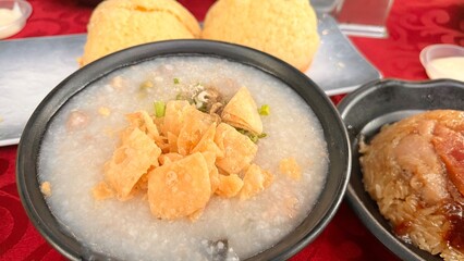 Chicken porridge and baked bread 